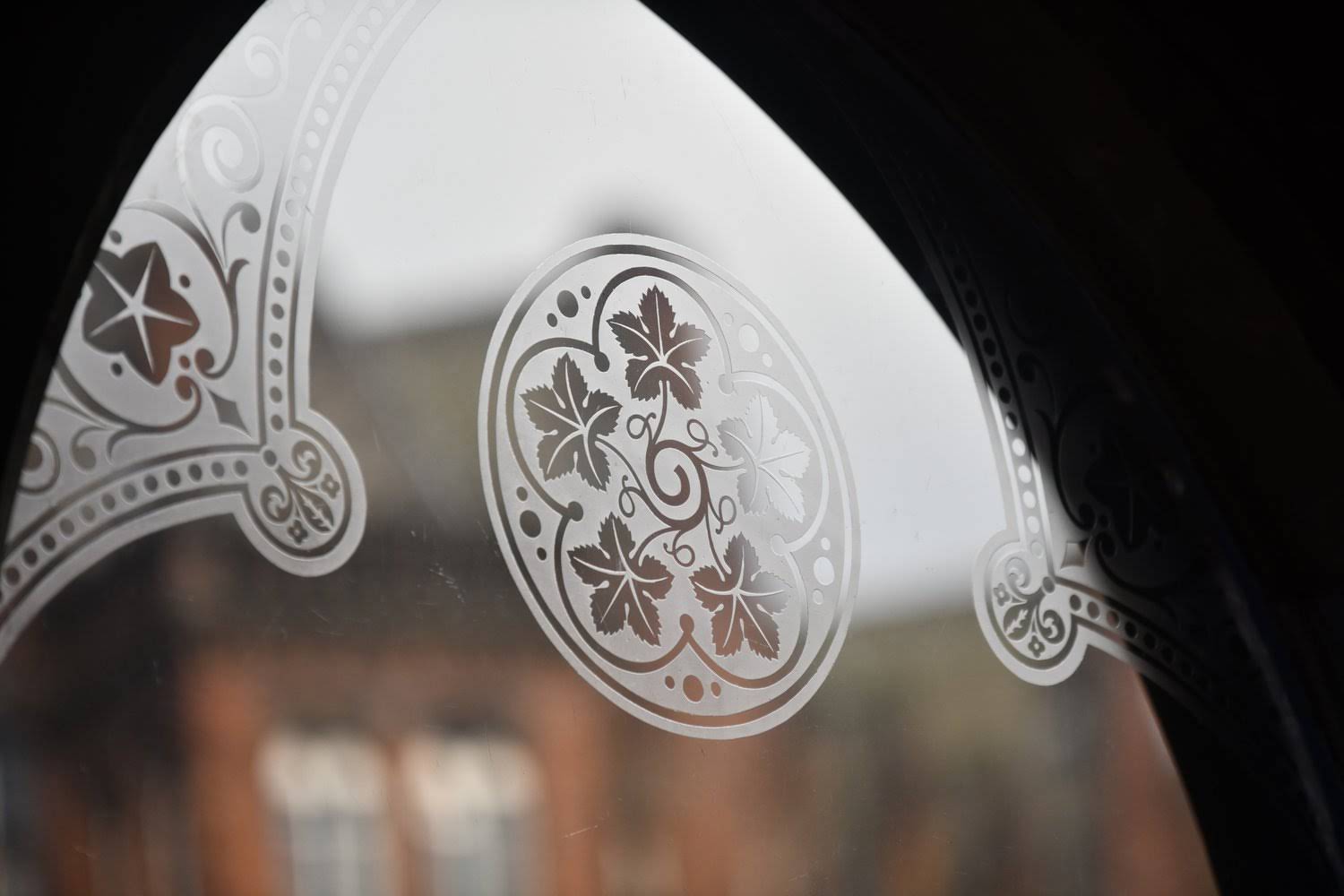 Decorative etched glass in the historic Stage building